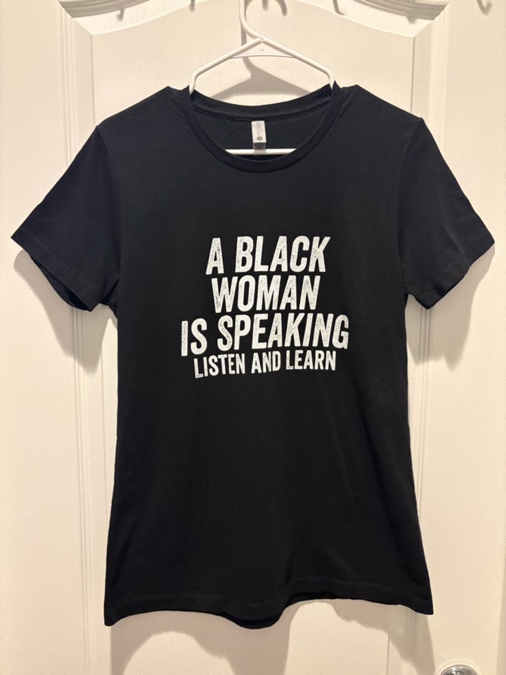 empowering graphic t-shirt  "A Black Woman Is Speaking Listen and learn”